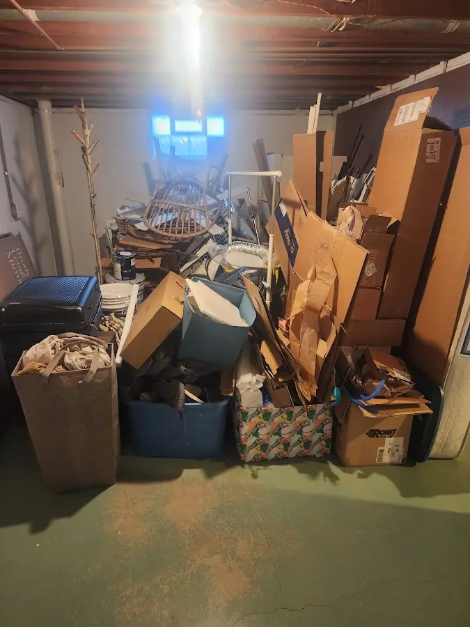 Roll-off dumpster container at job site for Yard Waste Dumpster Rental in Hillsdale